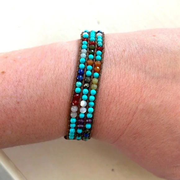 Multicolored gemstone leather wrap bracelet.